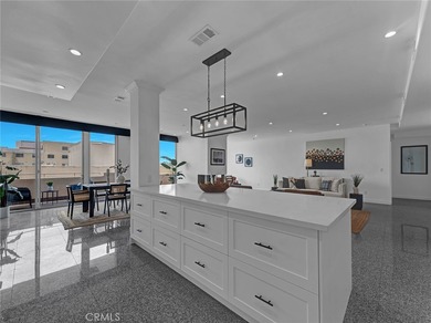 Welcome to this beautifully remodeled condo offering an elevated