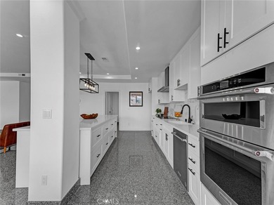 Welcome to this beautifully remodeled condo offering an elevated
