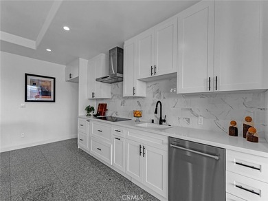 Welcome to this beautifully remodeled condo offering an elevated