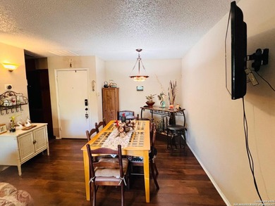 Prime Location & Security! This move-in ready condo is nestled