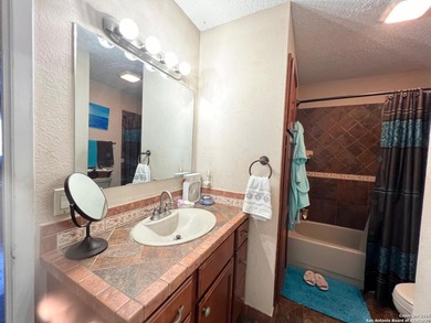 Prime Location & Security! This move-in ready condo is nestled