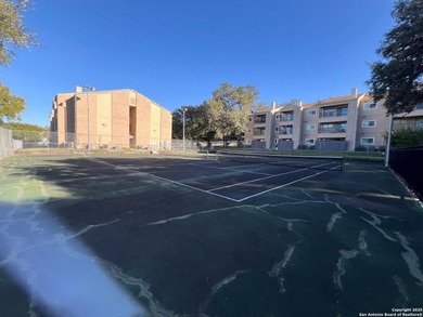 Prime Location & Security! This move-in ready condo is nestled