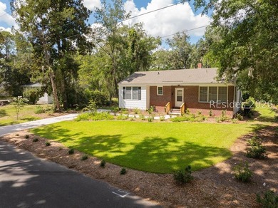 Welcome to your newly renovated haven in the highly sought-after - photo 3