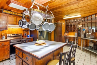 From the moment you step into the stunning chef's kitchen with - photo 4