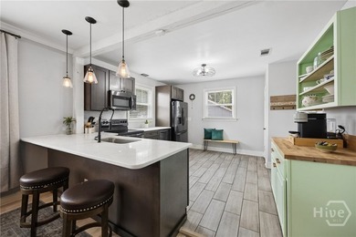 Just steps from Gordonston sits the MOST charming 1940s bungalow - photo 13