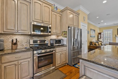 Four-bedroom, three-bathroom, elevated coastal home with a - photo 8
