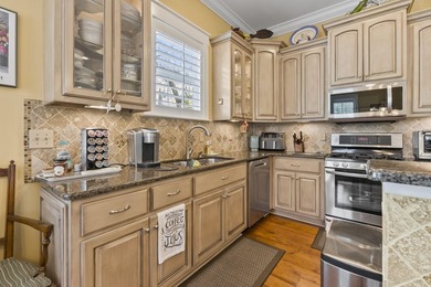 Four-bedroom, three-bathroom, elevated coastal home with a - photo 9