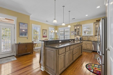 Four-bedroom, three-bathroom, elevated coastal home with a - photo 10