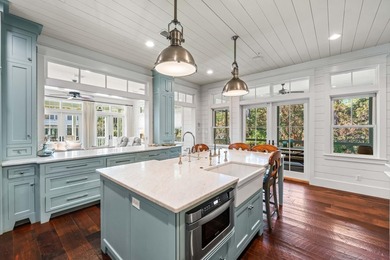 This stunning custom home in WaterColor is a masterful blend of - photo 12