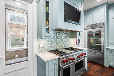 This stunning custom home in WaterColor is a masterful blend of - photo 13