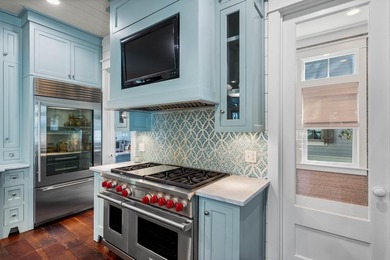 This stunning custom home in WaterColor is a masterful blend of - photo 14