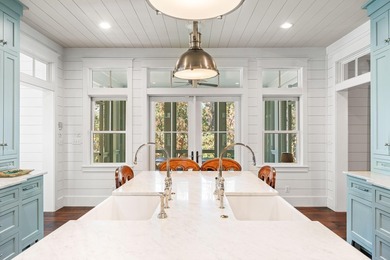 This stunning custom home in WaterColor is a masterful blend of - photo 16