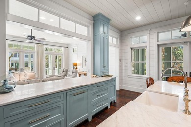 This stunning custom home in WaterColor is a masterful blend of - photo 17