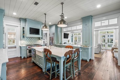 This stunning custom home in WaterColor is a masterful blend of - photo 18