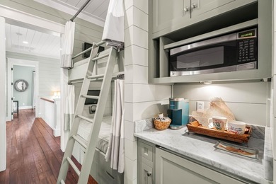 This stunning custom home in WaterColor is a masterful blend of - photo 41