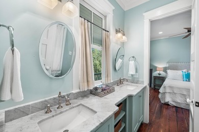 This stunning custom home in WaterColor is a masterful blend of - photo 43
