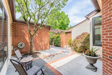 Welcome to this elegant gated condominium in the highly - photo 3