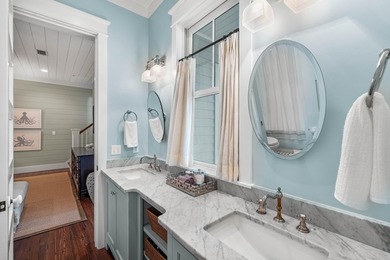This stunning custom home in WaterColor is a masterful blend of - photo 44