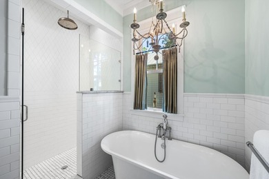 This stunning custom home in WaterColor is a masterful blend of - photo 60