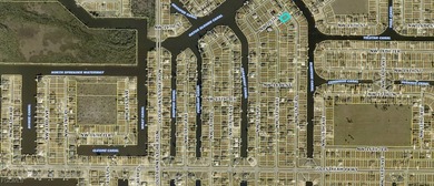 BUILDERS and INVESTORS!! CORNER LOT ACROSS FROM GULF ACCESS - photo 2