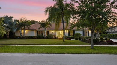 Tucked away within one of East West Palm Beach's most - photo 1