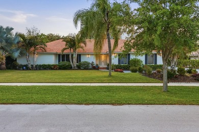 Tucked away within one of East West Palm Beach's most - photo 2