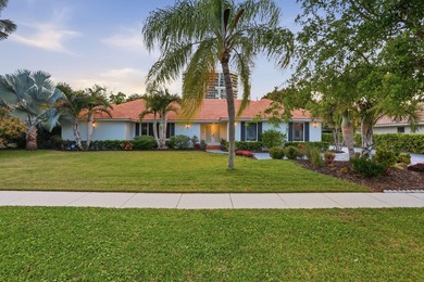 Tucked away within one of East West Palm Beach's most - photo 3