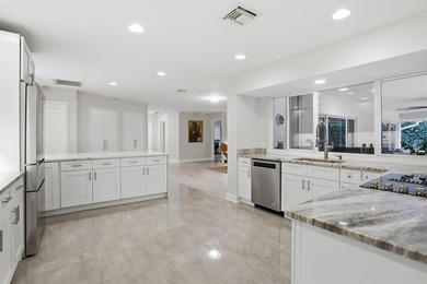 Tucked away within one of East West Palm Beach's most - photo 10