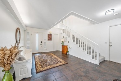 Tucked inside the prestigious gated community of Emerald Bay in - photo 3