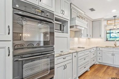 Tucked inside the prestigious gated community of Emerald Bay in - photo 8