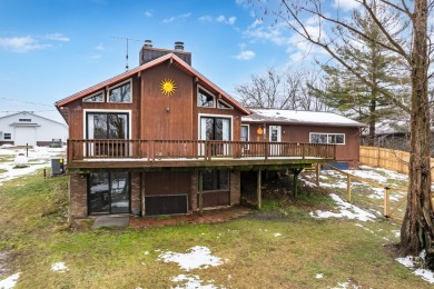 Nearly 8-acre retreat on Sweet Lake offering the perfect blend - Lake Home For Sale in Gobles, Michigan