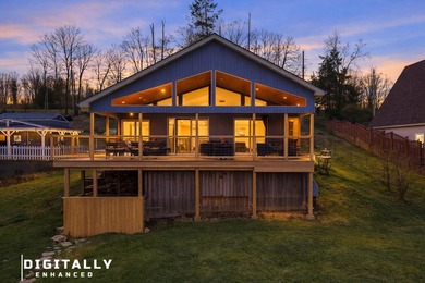 Welcome to a completely reimagined lakeside retreat on the - photo 3