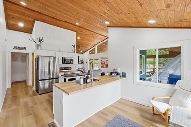 Welcome to a completely reimagined lakeside retreat on the - photo 4