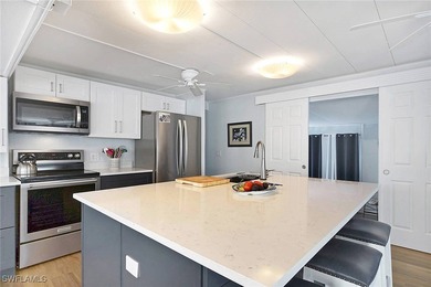 This beautifully remodeled 2-bedroom, 1-bath waterfront home - photo 5
