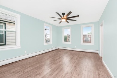 Welcome to this beautiful legal two-family home located in the - photo 6
