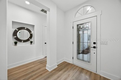 THOUGHTFULLY RENOVATED home in a prime location of the highly - photo 7