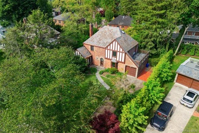 Storybook charm meets timeless elegance in this classic Tudor - photo 2