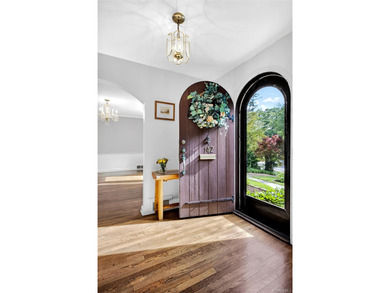 Storybook charm meets timeless elegance in this classic Tudor - photo 3