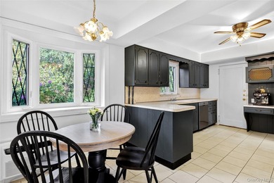 Storybook charm meets timeless elegance in this classic Tudor - photo 10