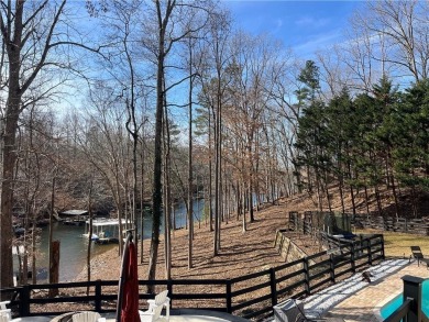 Lake Home For Sale in Flowery Branch, Georgia