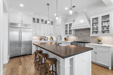 Discover unmatched luxury in this stunning three story retreat - photo 8