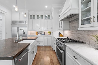 Discover unmatched luxury in this stunning three story retreat - photo 10