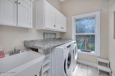 Welcome home to this beautifully designed 4-bedroom, 2.5-bath - photo 25