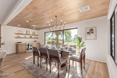 E X Q U I S I T E Golf Course Residence. Inside, you'll find a