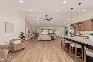 E X Q U I S I T E Golf Course Residence. Inside, you'll find a