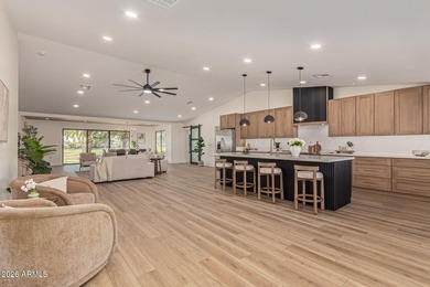 E X Q U I S I T E Golf Course Residence. Inside, you'll find a