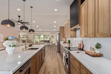 E X Q U I S I T E Golf Course Residence. Inside, you'll find a