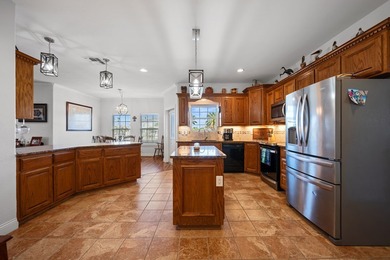 Located in the sought-after sea-gated community of Pelican Cove - photo 17