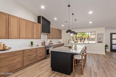 E X Q U I S I T E Golf Course Residence. Inside, you'll find a