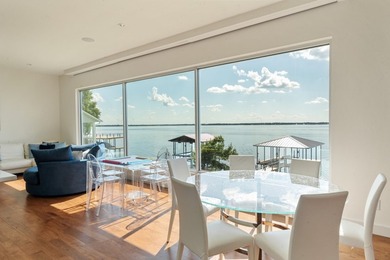 This is the lake house everyone has been waiting for. Positioned - photo 18